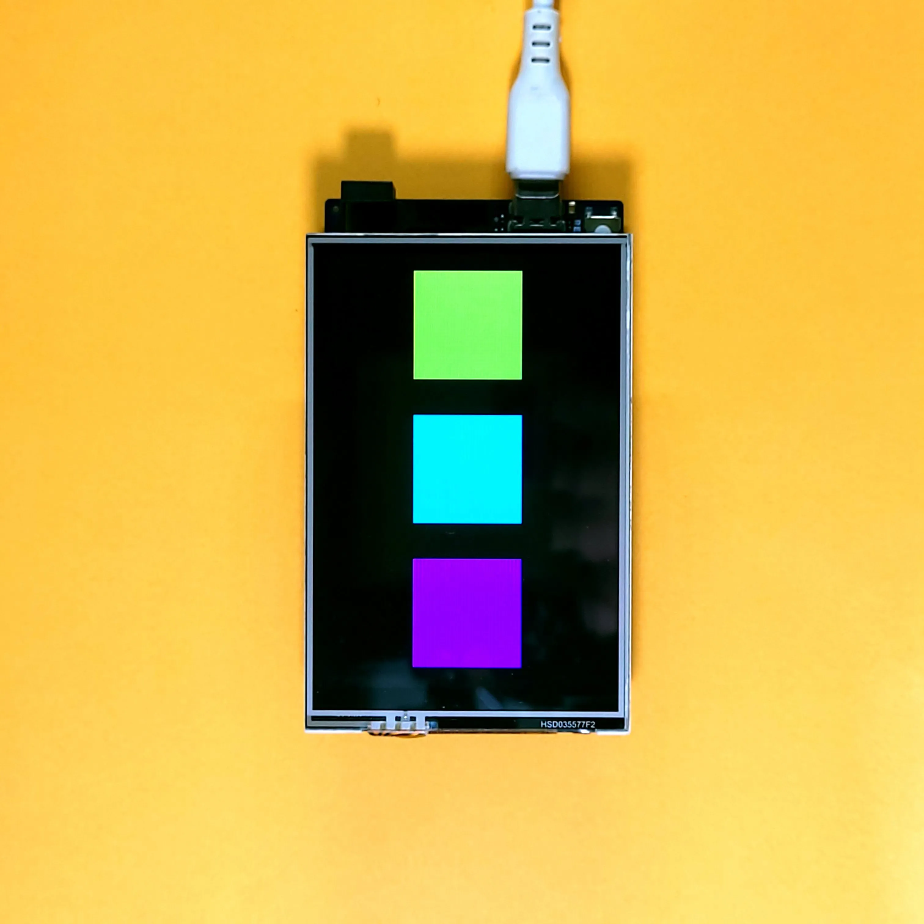 Image of three squares drawn on the ILI9486 TFT LCD Shield, colored Yellow, Cyan and Magenta